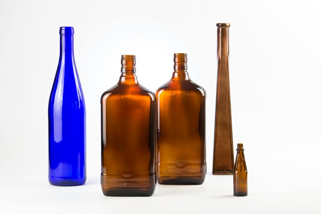 AI disrupts glass bottle manufacturing with premium honey jar showcasing precision engineering